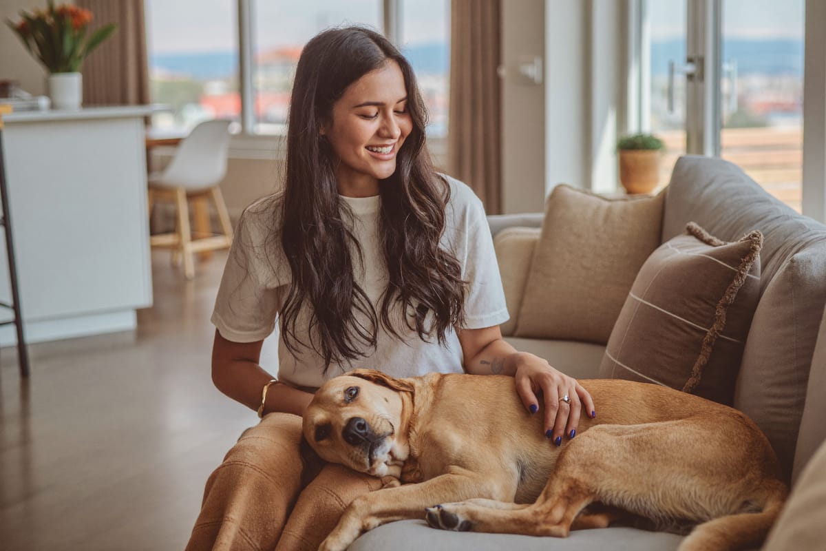A renter with their emotional support dog in a Texas apartment